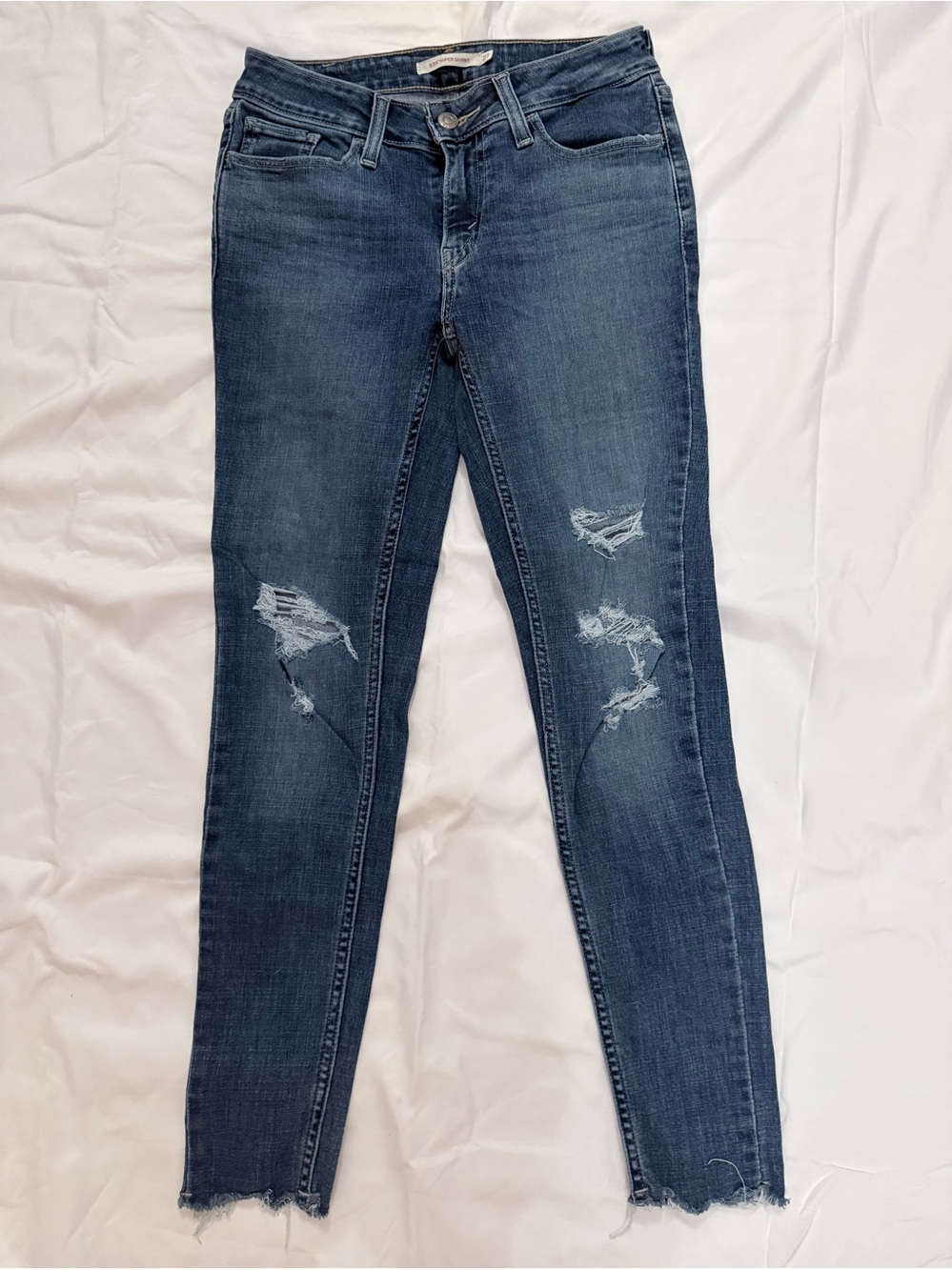 Levi’s 535 super skinny jeans sz 27 distressed GUC
